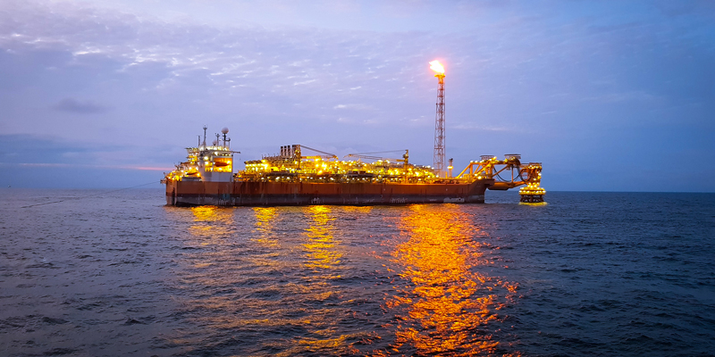 FPSO_floating-production-storage-offloading-unit an FPSO vessel at high sea after sunset