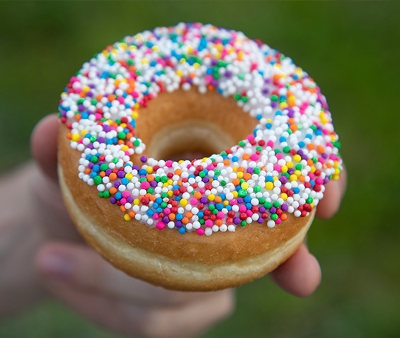 a doughnut with a lot of colorful sprinkles